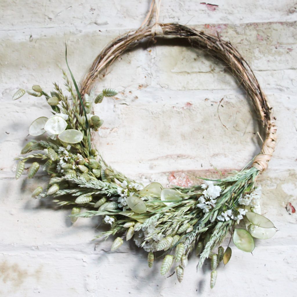 The signature Silver Acres Half Moon Wreath. Just one of the wonderful dried flower arrangements from Silver Acres Dried Flowers.