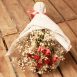 Front view of Dried Red Roses Bouquet wrapped in tissue paper and tied with silk bow from Silver Acres