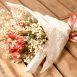 Dried Red Roses Bouquet wrapped in tissue paper and tied with silk bow from Silver Acres